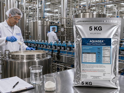 AQUASEA™ Ocean Trace Mineral Powder 5 kg silver Mylar bag used in a commercial sports drink manufacturing facility with stainless steel mixing tanks, food scientists, and an electrolyte beverage bottling line.